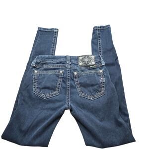 Miss Me Mid-Rise Skinny Jeans in a dark wash size 24